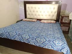 Low wood double bed