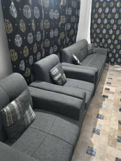 5 Seater Sofa Set With Center Table And 4 Stools + 5 Cushions.