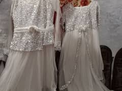 pair of white coloured maxi's for sale