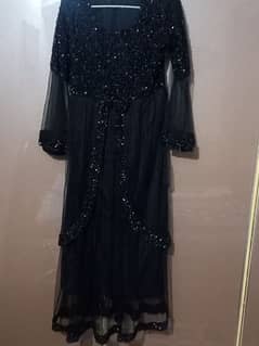 Black colour net frock heavy sitara work