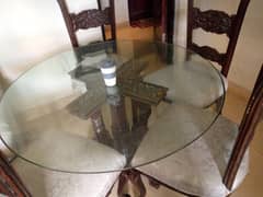 Round glass chunitie style dining table with 4 chairs