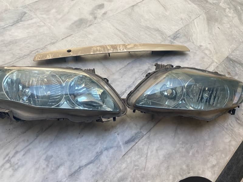 Toyota Corolla Gli 2010/2011 Genuine Kitto full set with garnish. 0