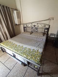Iron Double bed with mattresses and side Table