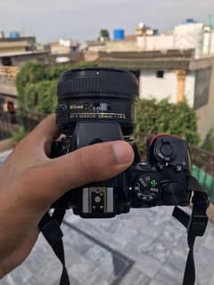 Nikon D5600 | with 50 mm lens and 18 55 mm ( Two lens )