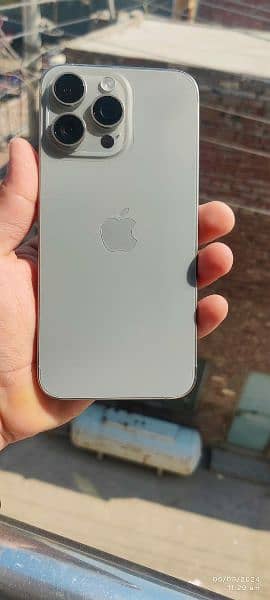 iPhone 15 pro max natural titanium 4