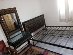 iron bed with dressing table