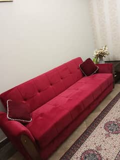 Molty velvet sofa cum bed in a excellent condition in Maroon colour .