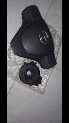 genuine steering wheel  cover with genuine Toyota logo and spiral kit