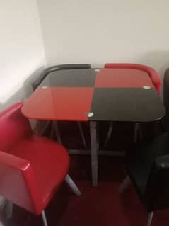 dinning table with 4 chairs. . . .