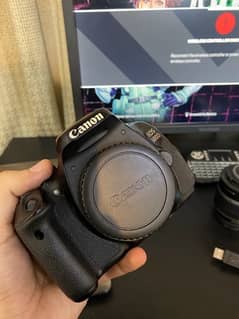 canon 600d with 2 lenses and 2 batteries nd bag