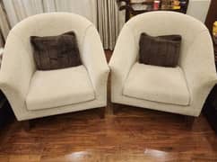 Two 1 seater sofas