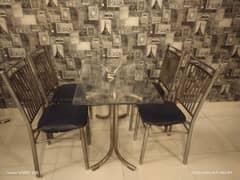 Table with 4 chairs for sale.