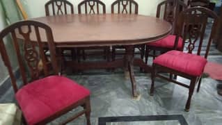 Urgent Sale. Wooden Dining table    only interested people contact me