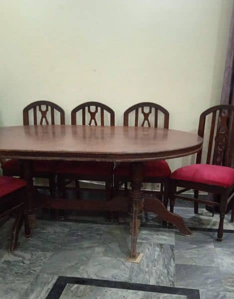 Urgent Sale. Wooden Dining table    only interested people contact me 1