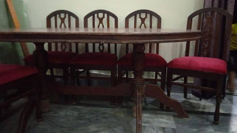 Urgent Sale. Wooden Dining table    only interested people contact me 2