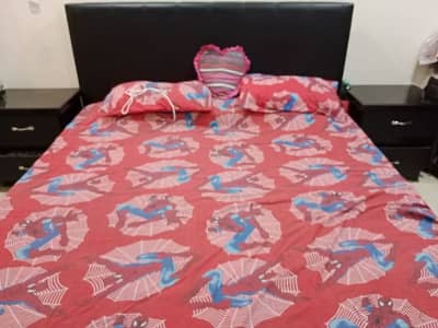 double bed with 2 side table with 2 single sofa n table