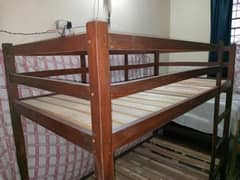 wooden bunk bed with out matress used very responsible price