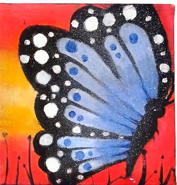 "A butterfly's delicate wings danced on the canvas, vibrant and free. 2