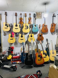 Wow Guitars Violins Cajon Store in Islamabad city Best Guitar shop