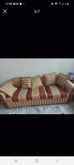 7 seater sofa for sale with 2 glass tables free