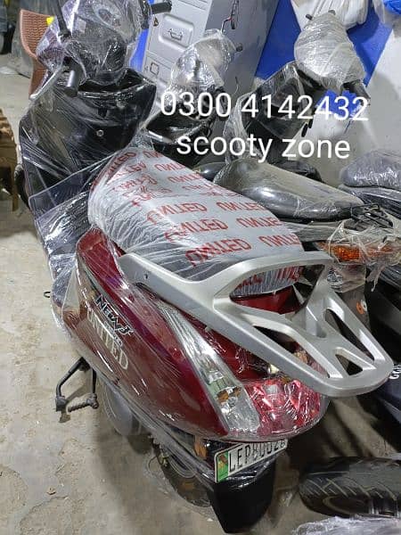 united scooty and 49cc scooty available contact at 0300 4142432 6