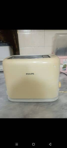 Philips Toaster now at Throw Away Price Fits two slices of br 9