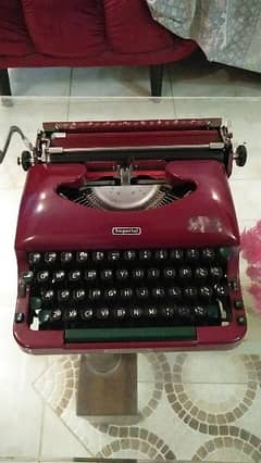 old antique imperial typewriter maroon color