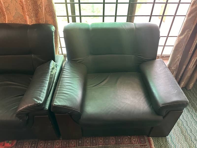 3 seater 2 sofas and 3 single sofas. 1