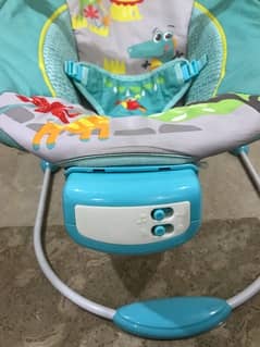 Baby bouncer with music and vibration