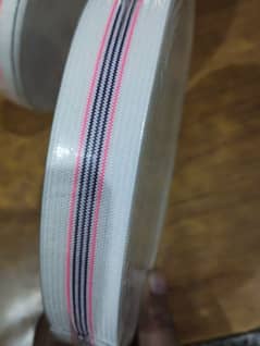 Elastic band for trousers and other garments