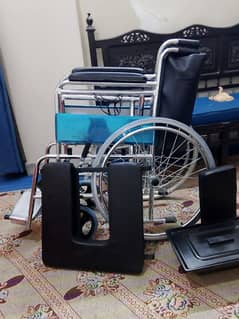 Wheel chair commode folding