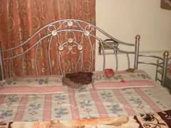 rod iron bed without matress .