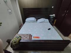 Bed with side table, almari, dressing table