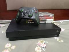 Xbox console with remotes.