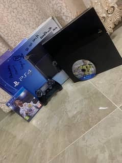 ps4 with box and controller with 2 cds