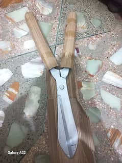 Gardening Scissor with wood handle. Gardening tool. Plant cutter