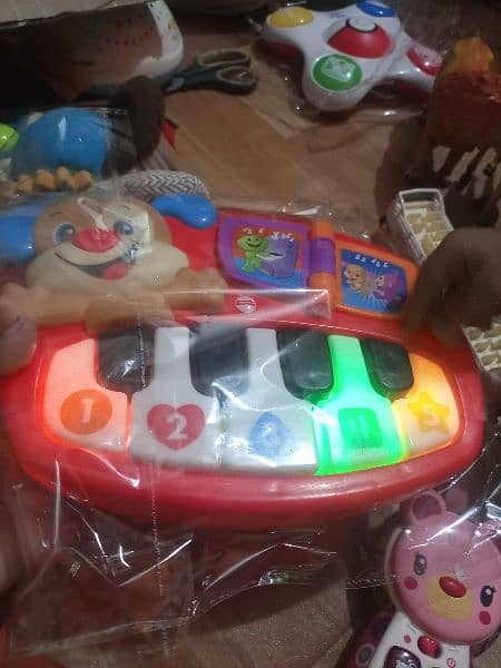 piano ,guitar ,dinosaur ,mobile ,rattles ,bear ,poo,pre-love 6