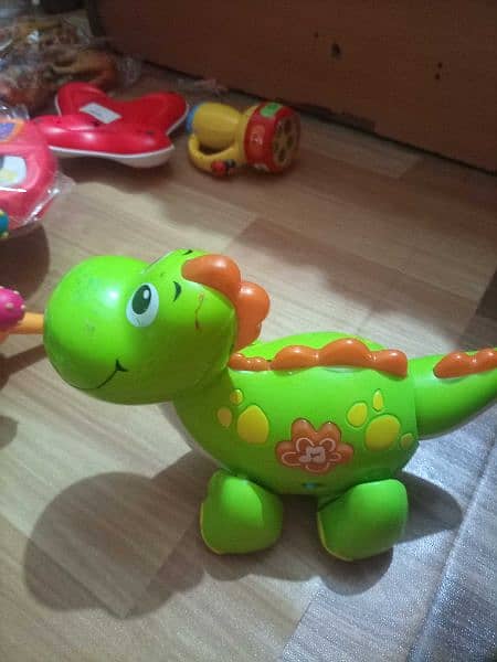 piano ,guitar ,dinosaur ,mobile ,rattles ,bear ,poo,pre-love 9