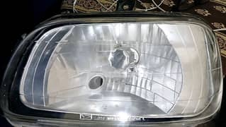 coure car crystal left side headlight 03224664990