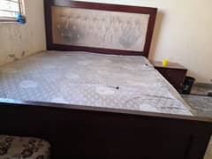 10/7 condition wood bed with side tables and 6 drawers cupboards