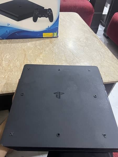 Playstation 4 slim 1tb Uk region with games included 3