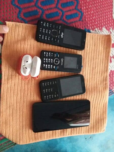 Aqous zero 2 Non pta + nokia 230 + Qmobile + earbuds 1