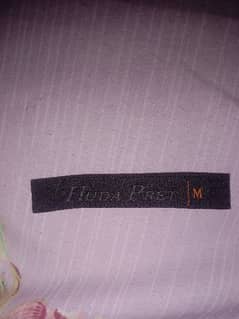 shirt size label ( HUDA PRET ) LOGO NAME
