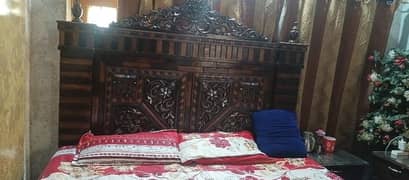 bed set with side tables, dressing table with one sitting chair