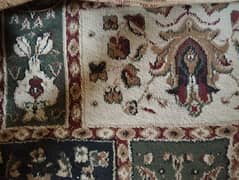 2 carpets for sale, both of different sizes and prices