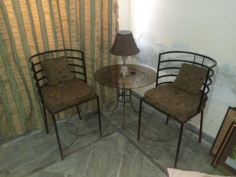 iron bed with 2 chairs one table 1