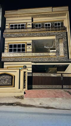 10 Marla Brand New Triple Story House Available For Sale In Gulshan Abad.