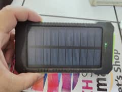 FLOUREON 10,000mAh Solar Power Bank Portable with LED Flashligh-