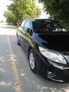 Toyota Corolla XLI 2010 exchange possible with mehran alto cultus