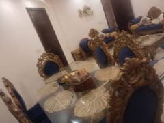 9 seater sofa along with Dewan also a centre Table and 2 side tables